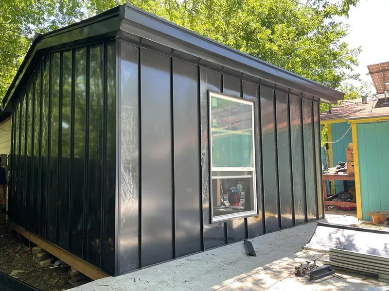 Black standing seam metal wall panels for Roof Inspection in Ayden