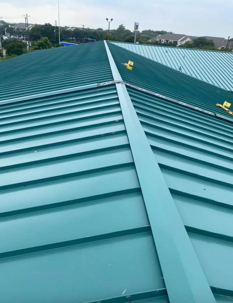 Green commercial metal roof ridge and valley for Metal Roof Repair in Ayden